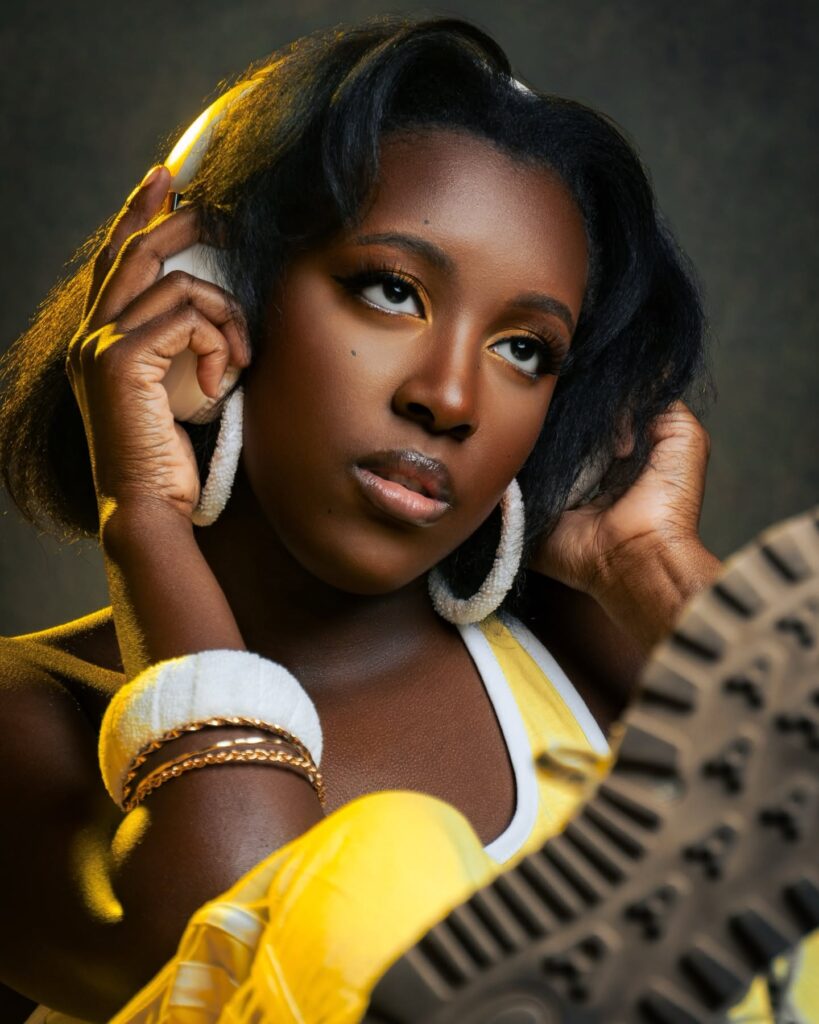 Yellow-headphones-model-1 Model in yellow with headphones - StudioEm Productions