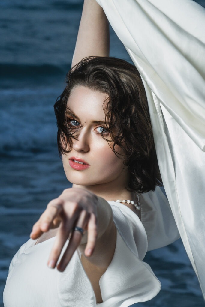ava-sea-portrait onsite portrait shoot of young woman with ocean - Photo by StudioEm Productions